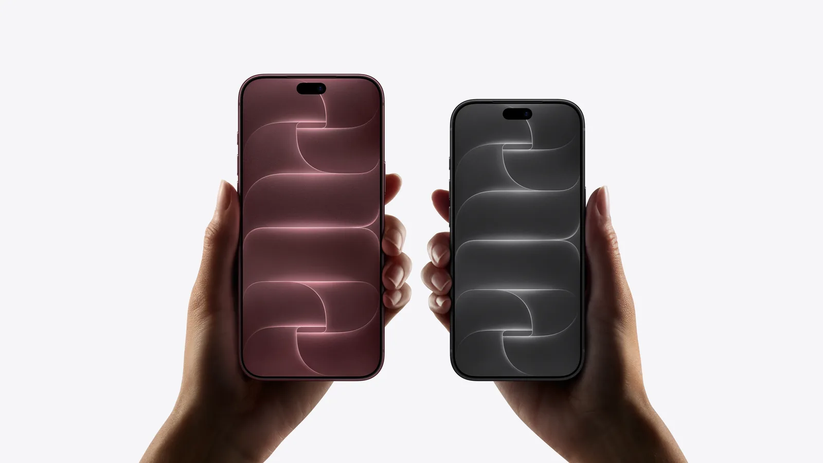 Dwa telefony iPhone 18 Pro w kolorze bordowym i czarnym, trzymane w dłoniach